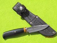 Behring B&T black Micarta back.JPG